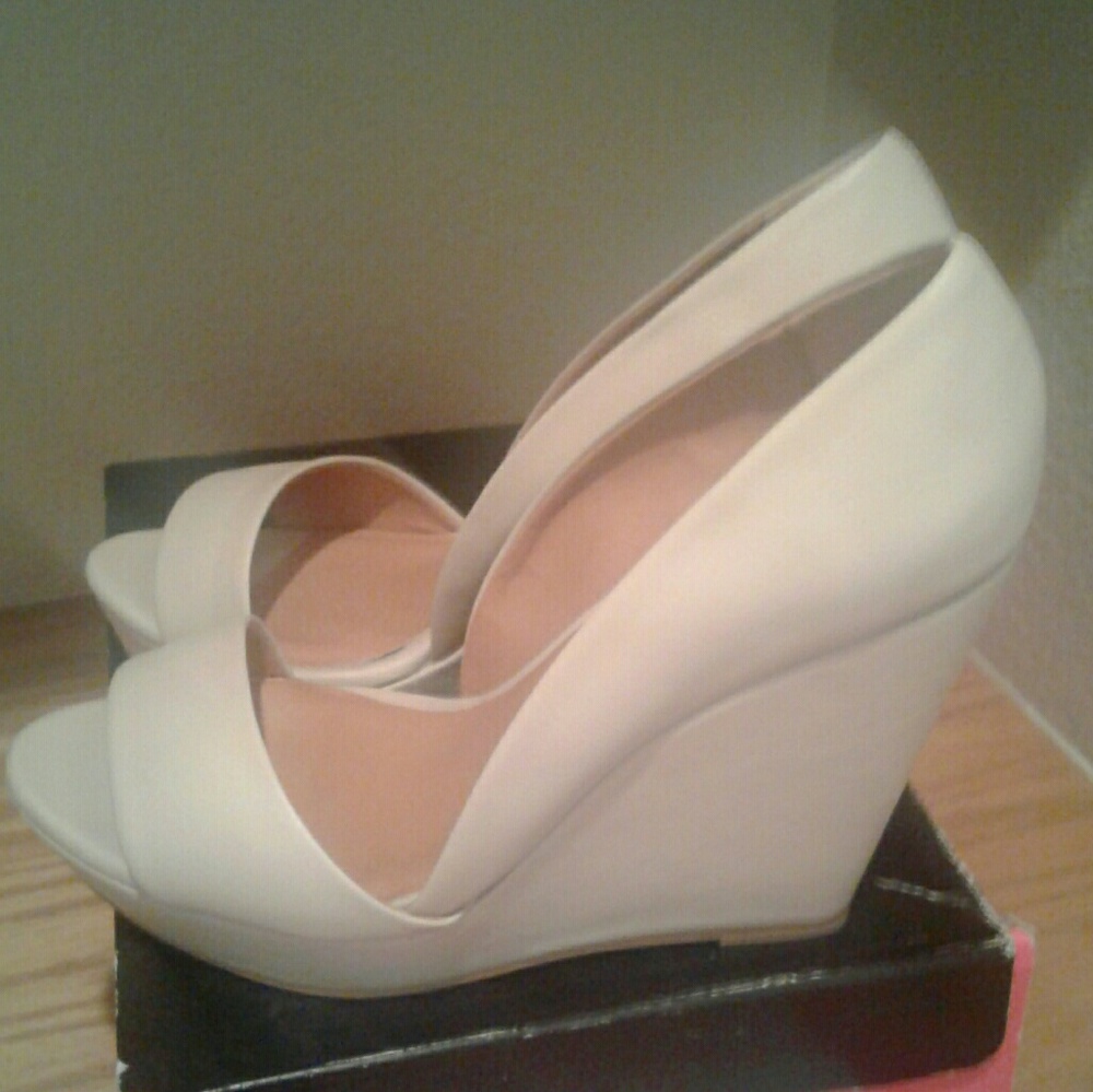 Never Worn new with box wedges